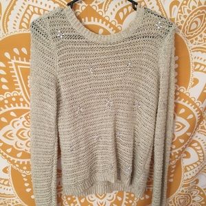 creme and gold sweater with flower gems